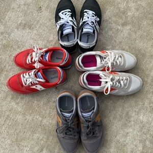 Collection of Saucony Black, Red, Off-White, & Gray Sneakers